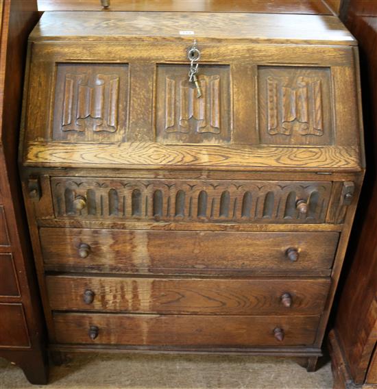 Oak linenfold carved bureau